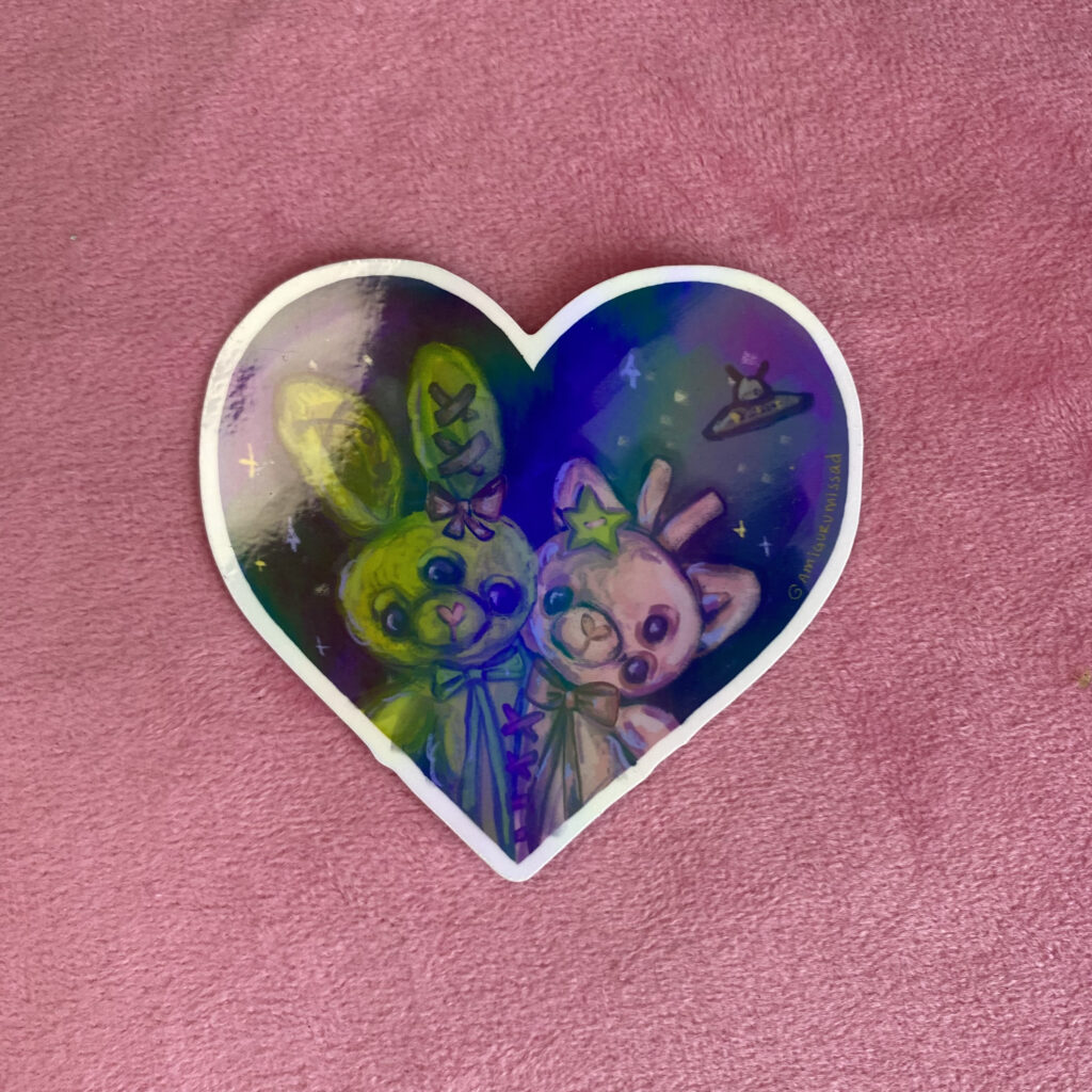 Xyli y Xal 💜 | Sticker Holográfico Alien Conejito y Gatito