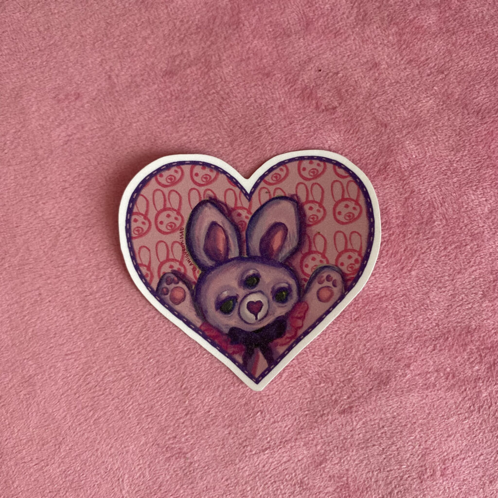 Nini 💜 | Sticker Glitter Conejita de Tres Ojos